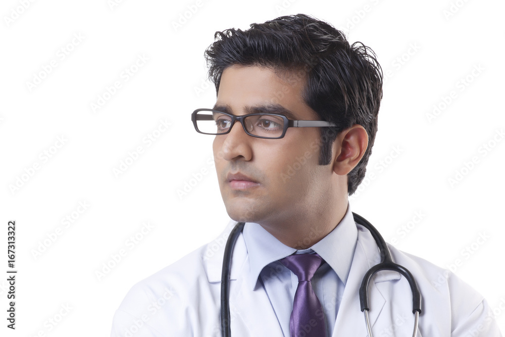 Close-up of handsome doctor over white background Close-up of handsome doctor over white background