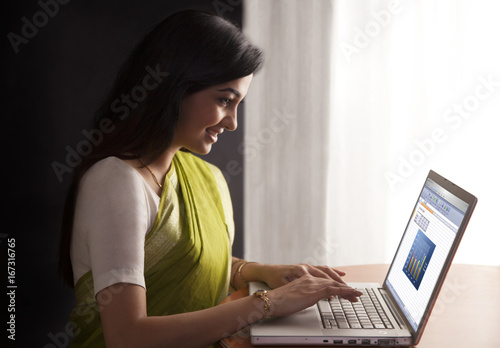 Woman working on a laptop 