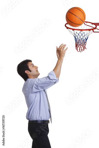 Executive playing basketball © IndiaPix