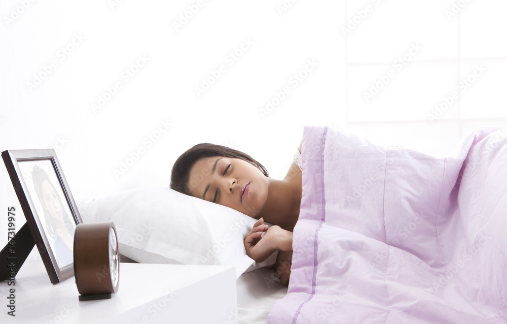 Girl sleeping on bed Girl sleeping on bed