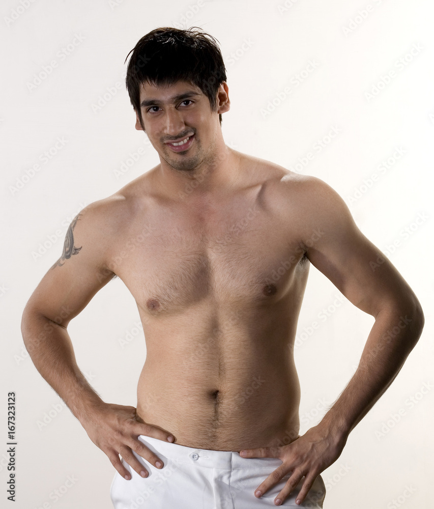 Man without a shirt posing 