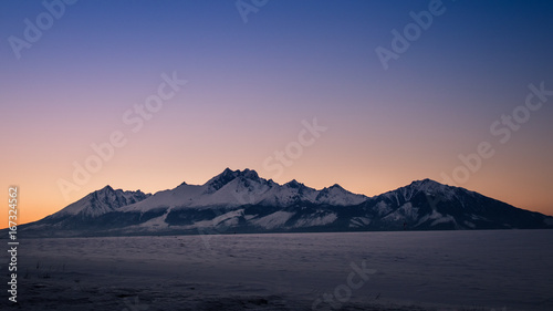 Winter panorama of High Tatras mountains at sunset  Slovakia  Europe.