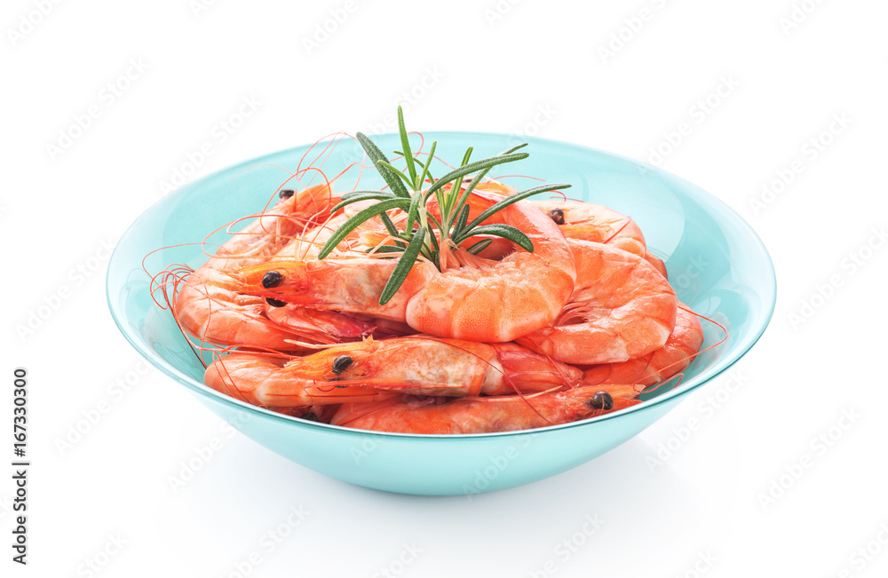 Fresh cooked shrimp on a plate isolated on white background. Fresh cooked shrimp on a plate isolated on white background.