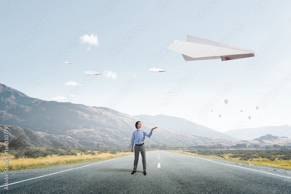Obraz premium Origami plane flying in sky. Mixed media