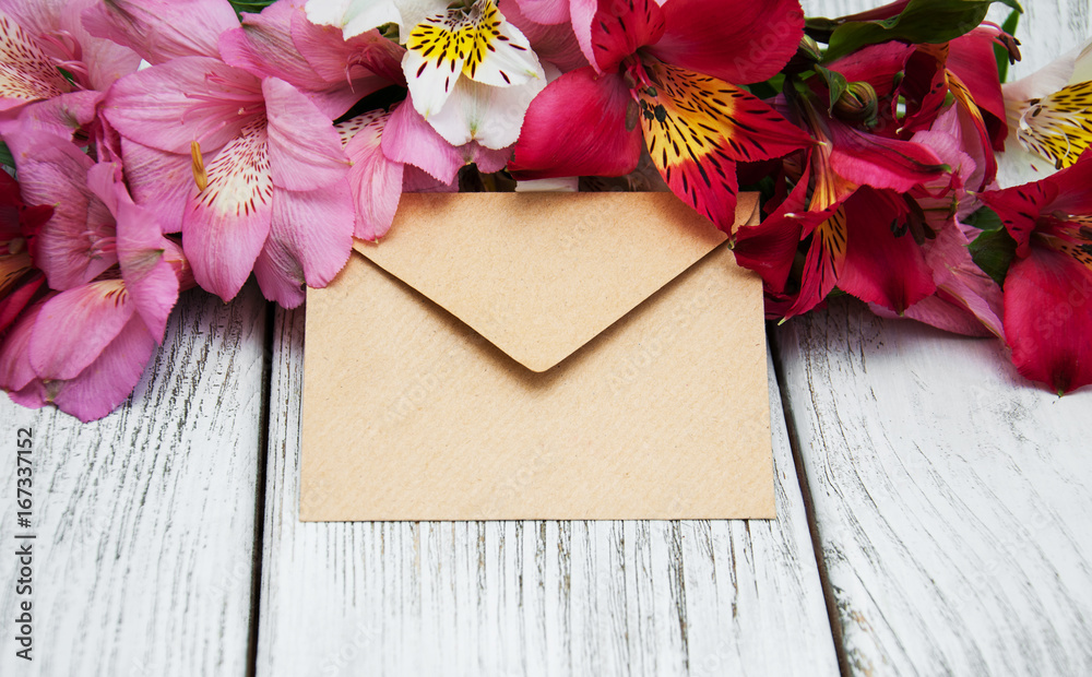 paper envelope with alstroemeria flowers