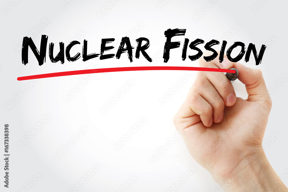 Hand writing Nuclear fission with marker, concept background Hand writing Nuclear fission with marker, concept background
