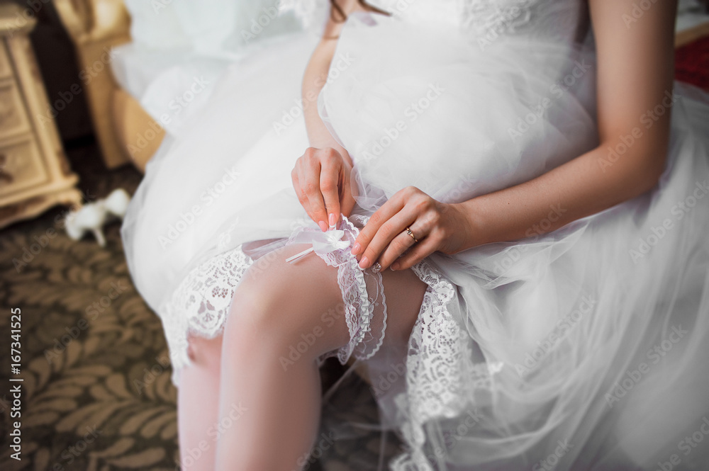 The bride wears a garter