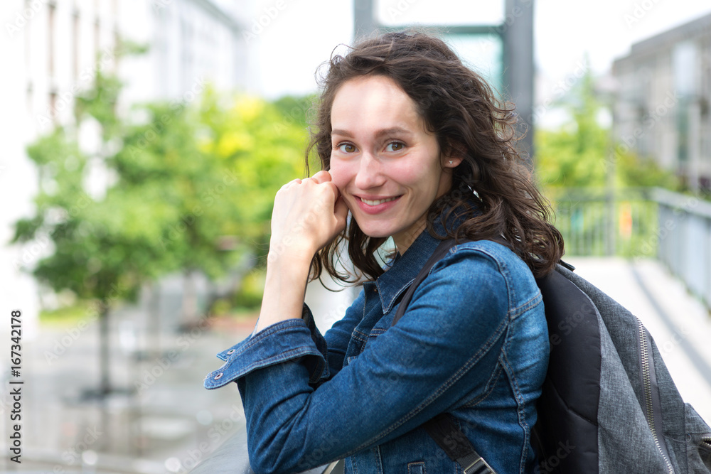 Portrait of a young student with backpack going to school and holding notebook - Back to school Portrait of a young student with backpack going to school and holding notebook - Back to school