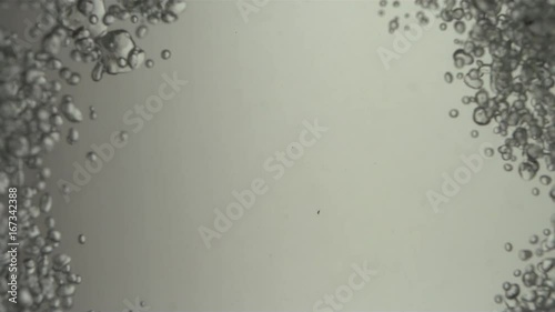 Bubbles Converge in on Grey Backdrop