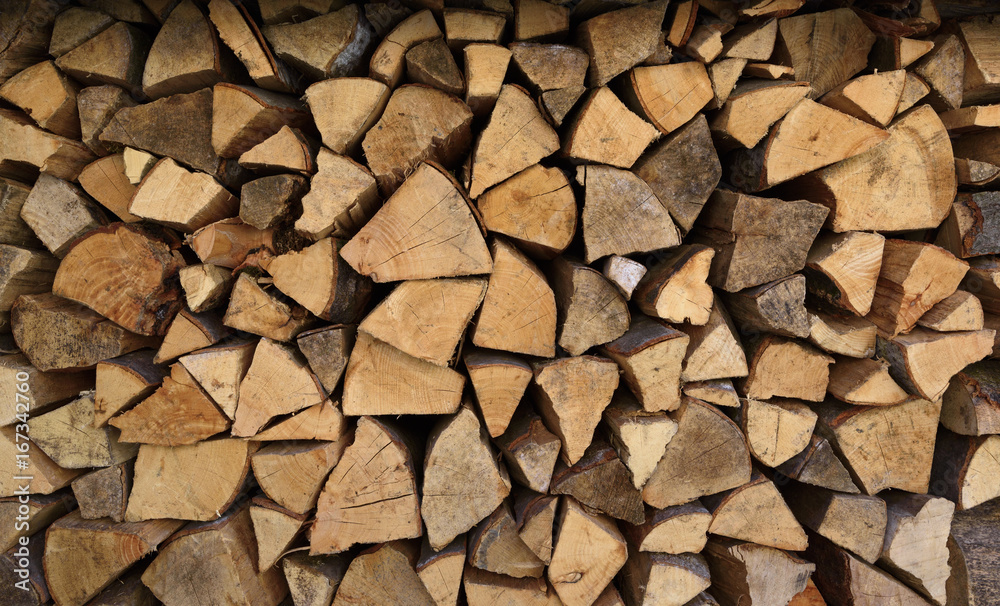 Chopped firewood woodpile close-up background Chopped firewood woodpile close-up background