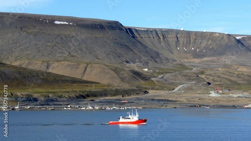 passing plataberget,a table mountain, during cruise through fjord near longyearbyen in svalbard.Plataberget is the site of Svalbard Satellite Station