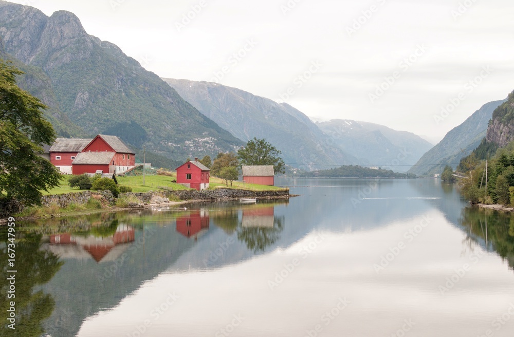 Red houses at lake in Norway