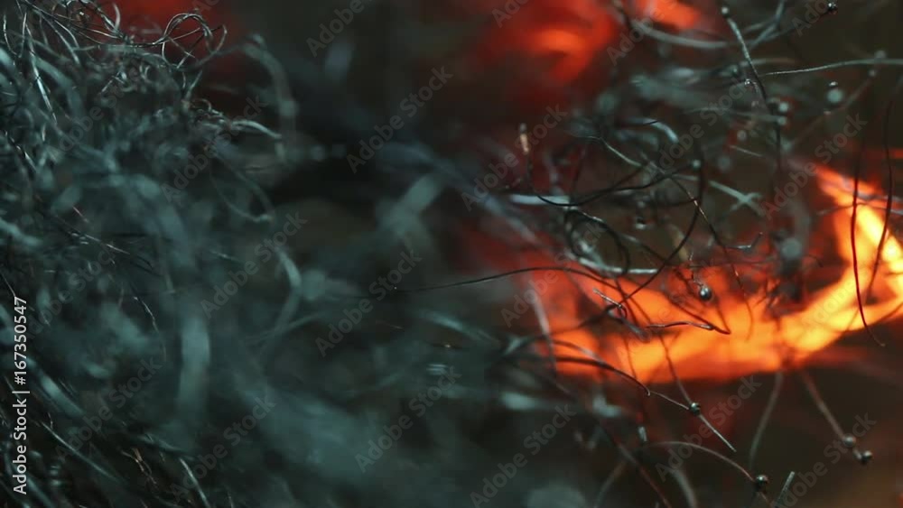 Heat travels through steel wool, macro close up