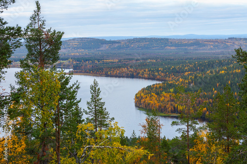 Fototapeta Naklejka Na Ścianę i Meble -  Autumn landscape with lake and beautiful forest, view from mountain, Lapland, Finland