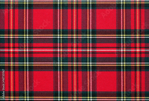 Close up of red, checkered textile background, texture with copy space photo