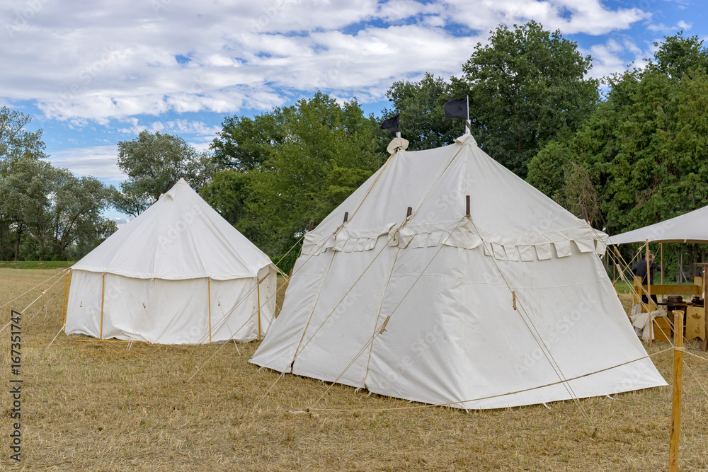 White tents on a medieval festival. Knights' Camp.