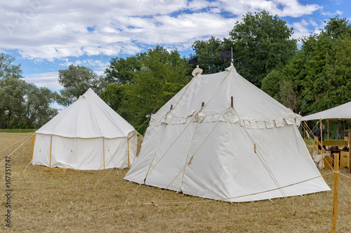 White tents on a medieval festival. Knights' Camp. © Peer Marlow