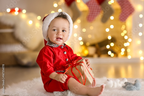 Cute little baby with Santa...