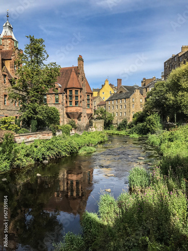 Peaceful Edinburgh scene of Water of Leith flowing through Dean Village