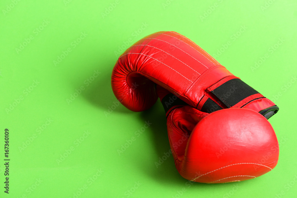 Sport equipment isolated on green background. Professional box