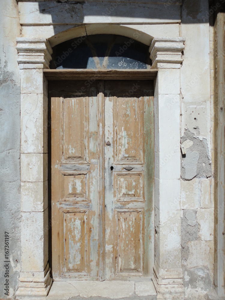 Old wooden door in Greece