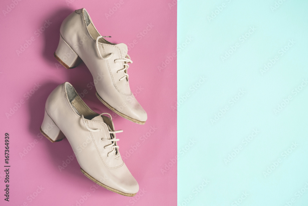 Poster Print Beige female dance jazz shoes on pink blue pastel background flat lay 40x26.7 cm