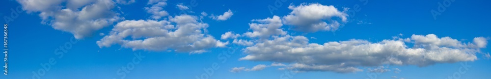 Blue sunny sky with white clouds landscape banner, huge panorama Blue sunny sky with white clouds landscape banner, huge panorama