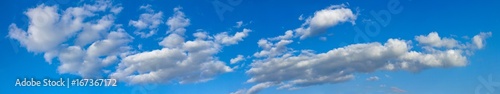 Blue sunny sky with white clouds landscape banner, huge panorama