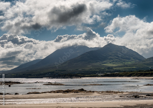 Croagh Patrick in clouds seen from Louisburgh small harbor, Ireland