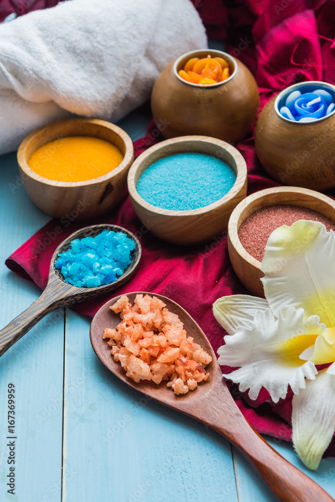 spa and massge items lay on blue wooden background