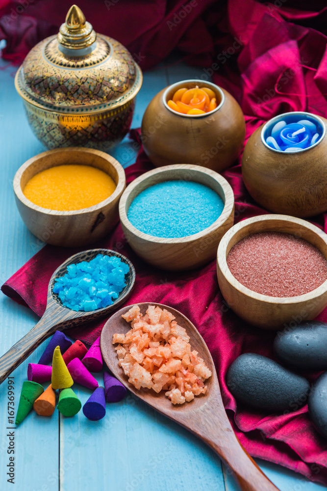 spa and massge items lay on blue wooden background spa and massge items lay on blue wooden background
