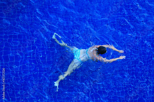 Woman swimmer in the pool