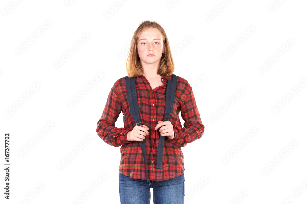 Studio portrait of red-haired female college student with backpack Studio portrait of red-haired female college student with backpack