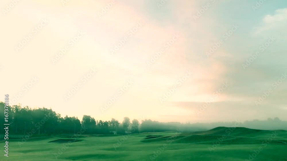 Beautiful dawn morning sun at empty and quiet golf course before anyone has arrived to play. Beautiful dawn morning sun at empty and quiet golf course before anyone has arrived to play.