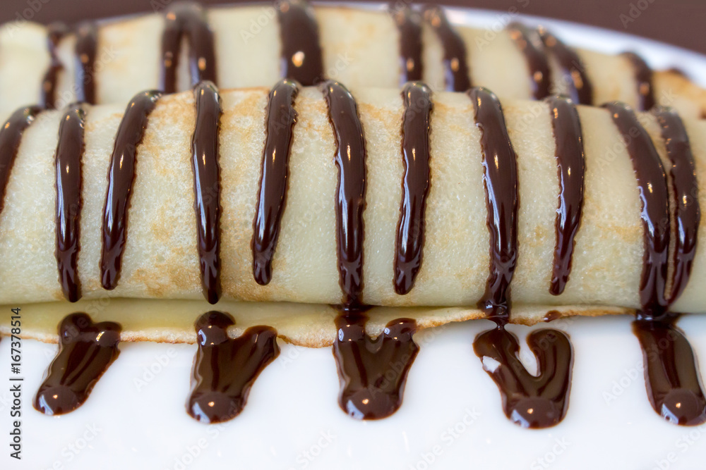 Crepes with chocolate topping Crepes with chocolate topping
