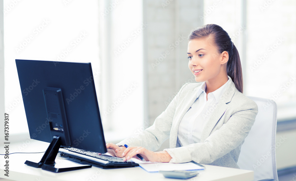 businesswoman with computer in office businesswoman with computer in office