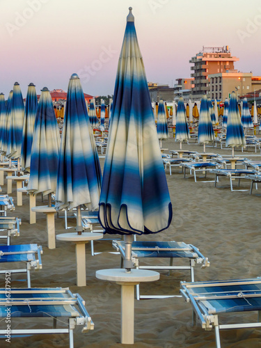 Rimini - White blue umbrellas and sunbeds © Venka