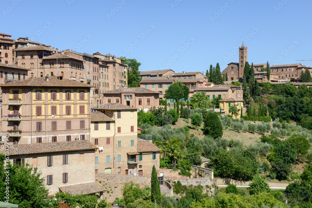 Ancient houses at old Siena on Italy