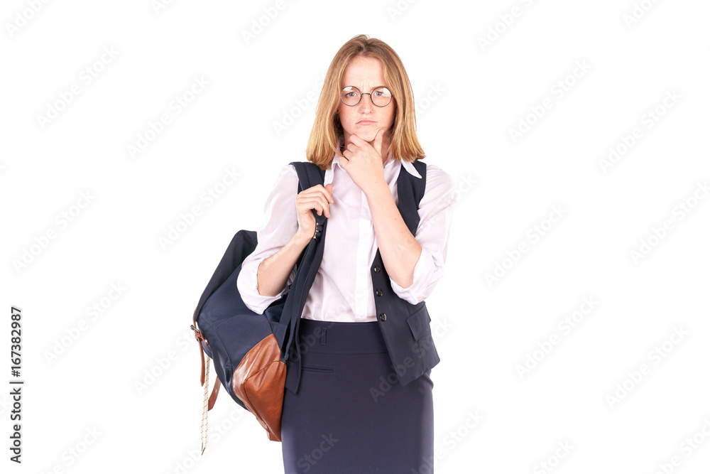 Portrait of beautiful red-haired college student in uniform posing against white background Portrait of beautiful red-haired college student in uniform posing against white background