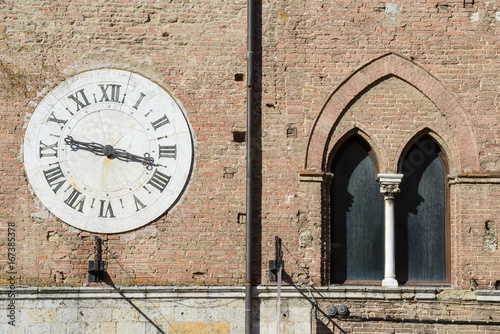 Detail of Salimbeni palace on Duomo square at Siena photo