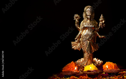 Lakshmi - Hindu goddess ,Goddess Lakshmi. Goddess Lakshmi during Diwali Celebration. Indian Hindu Light Festival called Diwali