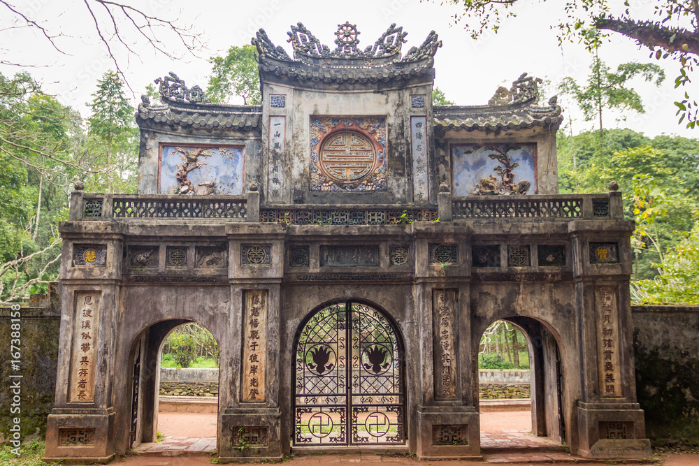Big old gate in pagoda at Hue Vietnam