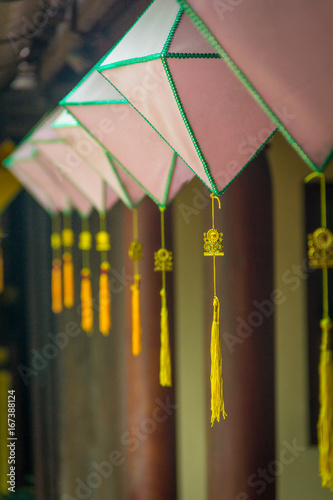 The yellow lanterns hanging in pagoda at Hue Vietnam