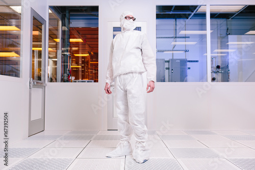 scientist in empty clean room