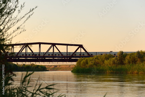 Lepsi river banks with railroad bridge, Kazakhstan, Taldykorgan © Colobus