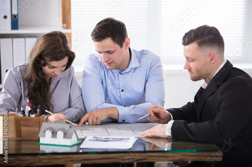 Real Estate Agent Meeting With Couple