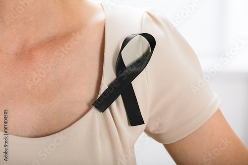 Woman With Black Ribbon To Support Breast Cancer Cause