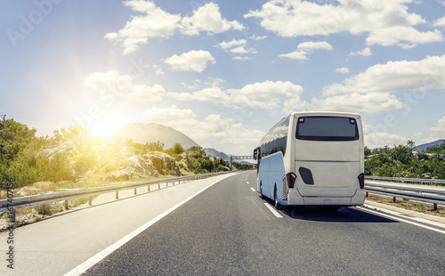 Canvas Print Bus rushes along the asphalt high-speed highway.