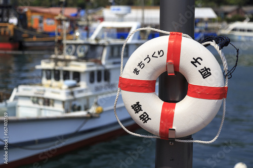  Fishing boat and Buoy in Yobuko harbor Japan photo