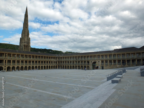 the piece hall in halifax a former eighteenth century cloth hall and public square with old church behind